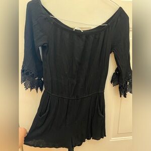 Black Papaya Romper with Fun Sleeve Design. Size Small